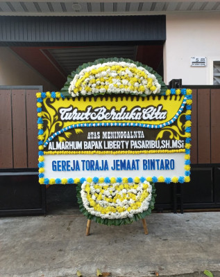 Papan Bunga Duka di Randakari